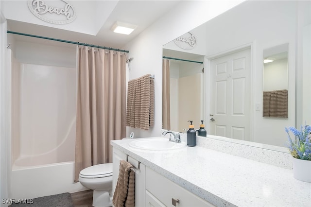 full bathroom with toilet, vanity, and shower / bath combination with curtain