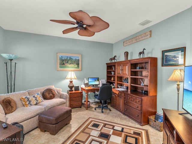 tiled office space with ceiling fan