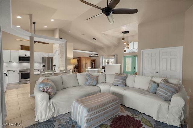 tiled living room featuring high vaulted ceiling