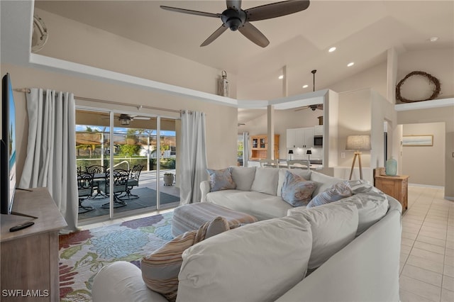 211 SW 21st Ln, Cape Coral, FL 33991 - living area with ceiling fan, light tile patterned flooring, high vaulted ceiling, and recessed lighting