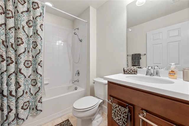 bathroom featuring shower / bath combo, vanity, toilet, and tile patterned floors