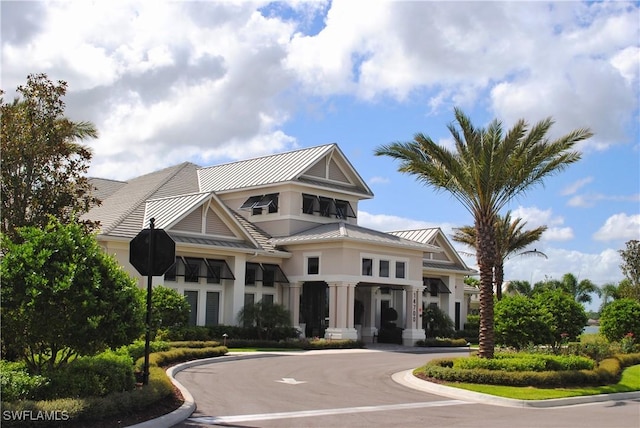 view of building exterior with driveway