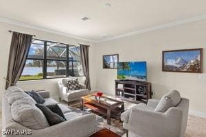 living area featuring ornamental molding