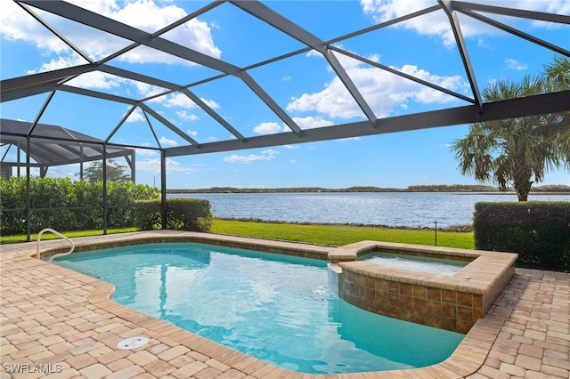 view of swimming pool featuring a patio area, a lanai, a water view, and a pool with connected hot tub