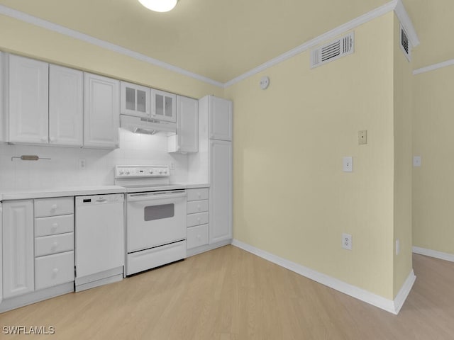 kitchen featuring ornamental molding, backsplash, white appliances, white cabinets, and light wood-type flooring