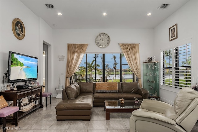 living room with light tile patterned flooring