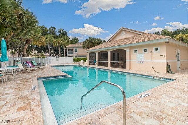 view of swimming pool featuring a patio