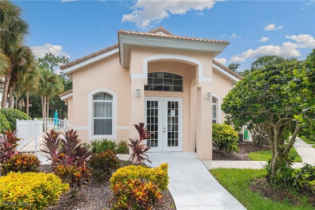 entrance to property featuring french doors