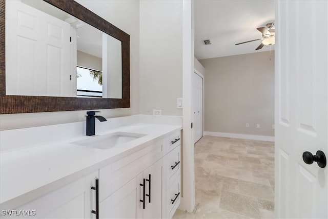 bathroom with vanity and ceiling fan