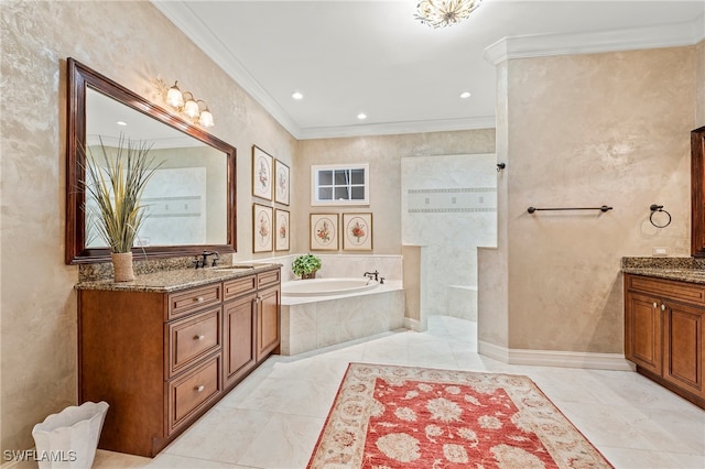 bathroom featuring vanity, tiled bath, and crown molding