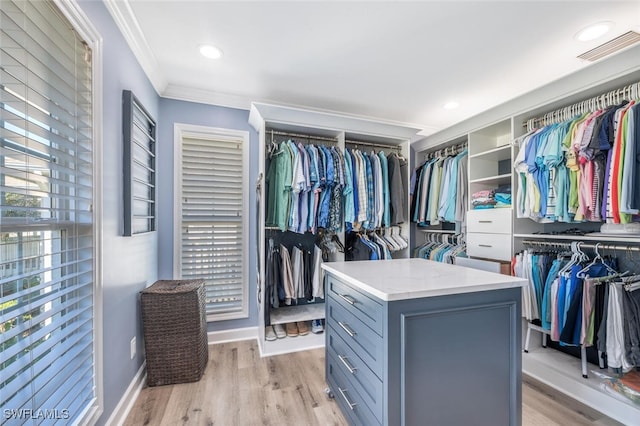 walk in closet featuring light wood-type flooring