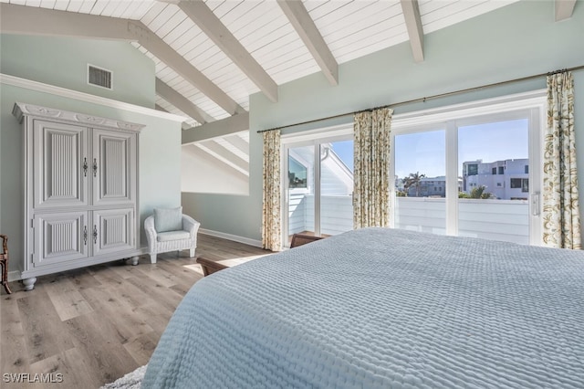 bedroom featuring access to outside, visible vents, light wood finished floors, and multiple windows