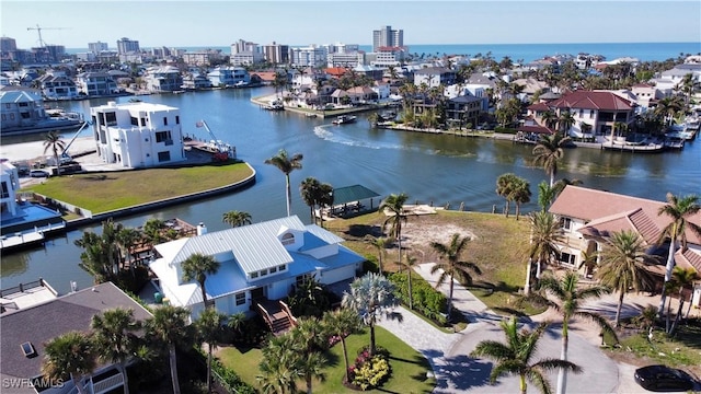 drone / aerial view with a water view and a city view