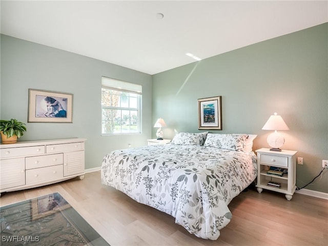 bedroom featuring light hardwood / wood-style floors