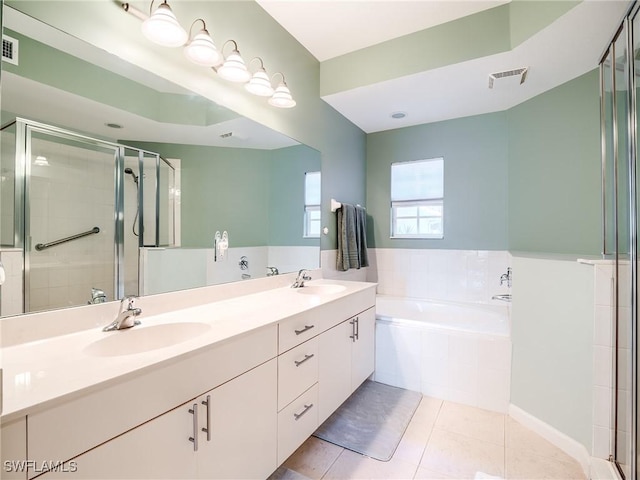 bathroom featuring vanity, tile patterned floors, and independent shower and bath