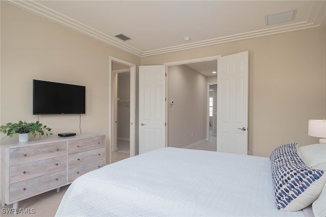 bedroom with carpet flooring and ornamental molding