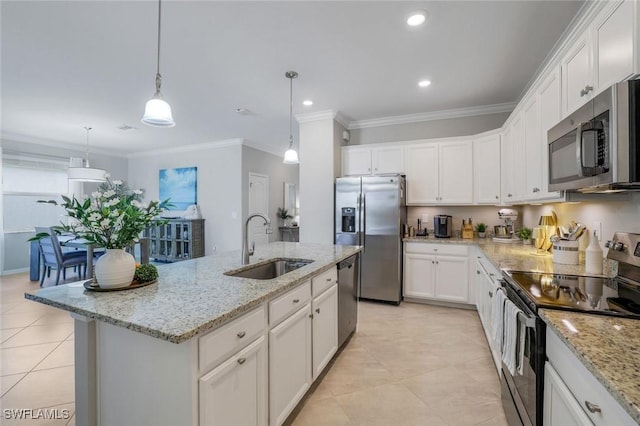 kitchen with a center island with sink, white cabinets, appliances with stainless steel finishes, crown molding, and a sink