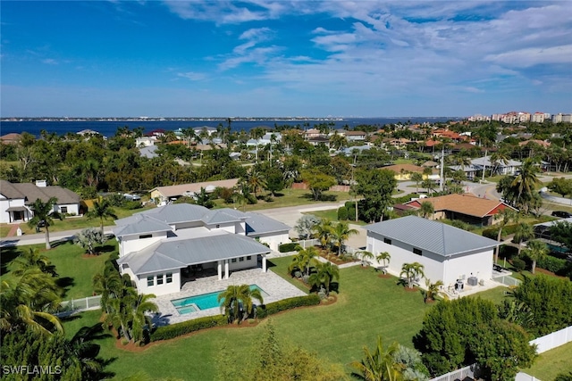 drone / aerial view with a water view