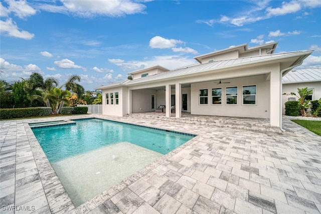 view of swimming pool with a patio area and ceiling fan