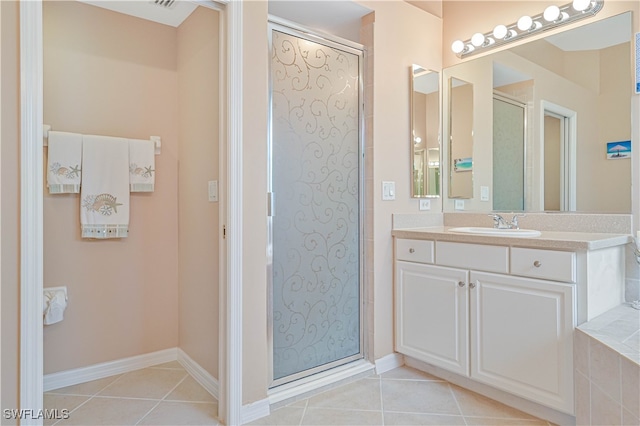 bathroom with vanity and tile patterned floors