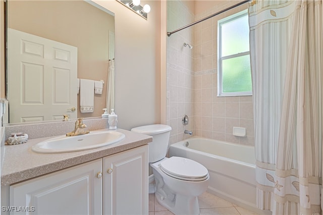 full bathroom featuring tile patterned flooring, vanity, shower / bath combination with curtain, and toilet