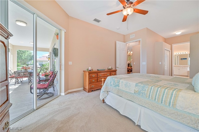 bedroom with connected bathroom, light carpet, access to exterior, and ceiling fan