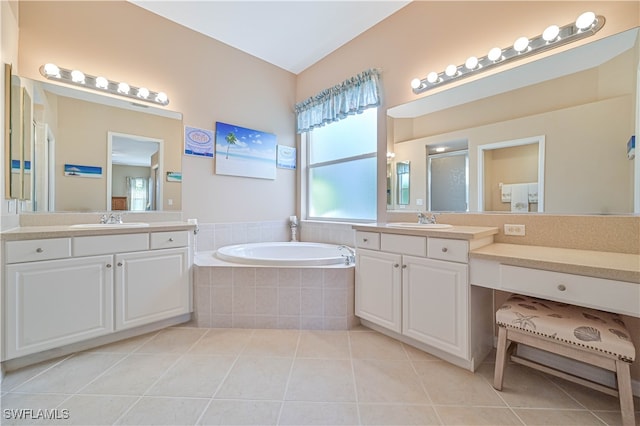 bathroom with vanity, tile patterned floors, and separate shower and tub