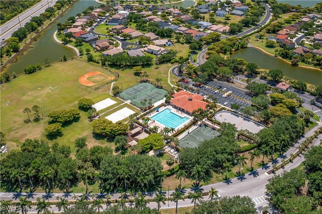 bird's eye view with a water view