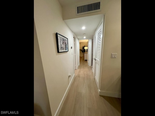 hall featuring light hardwood / wood-style flooring