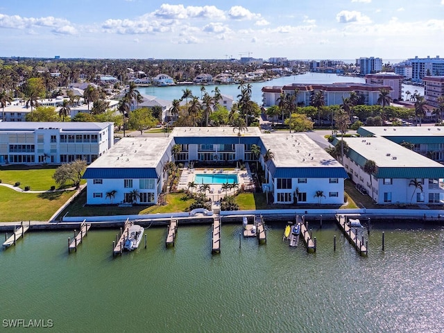 birds eye view of property featuring a water view
