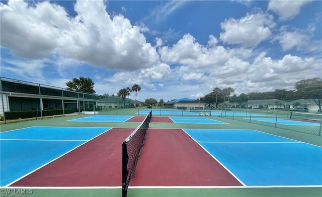 view of sport court featuring basketball hoop