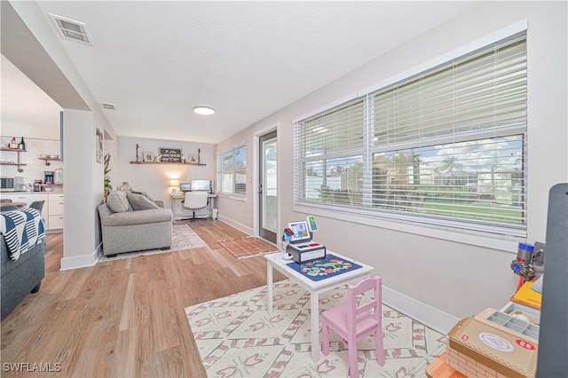 living room featuring light wood-type flooring