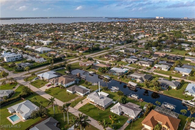 drone / aerial view featuring a water view