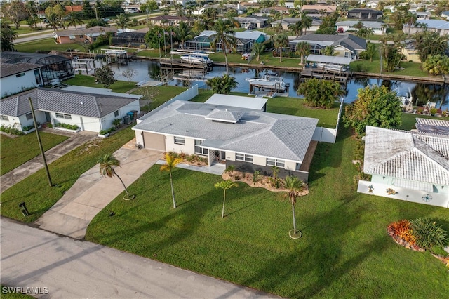 drone / aerial view featuring a water view