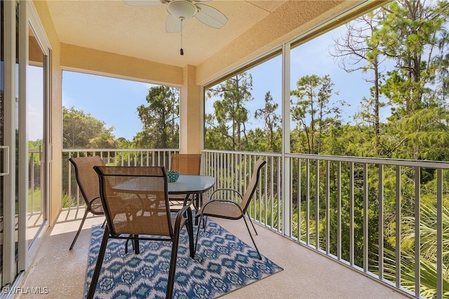 balcony featuring ceiling fan