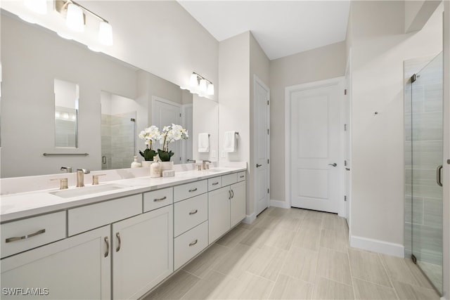 bathroom with vanity and walk in shower