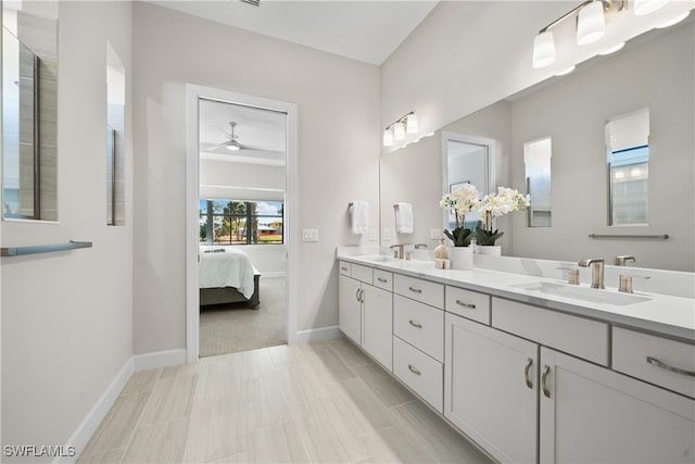 bathroom featuring vanity and ceiling fan