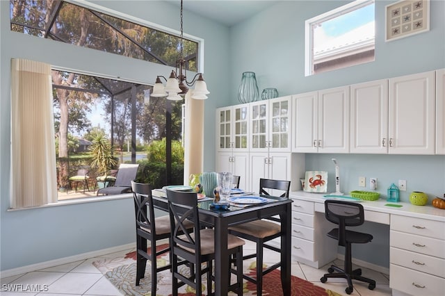 tiled dining room with plenty of natural light