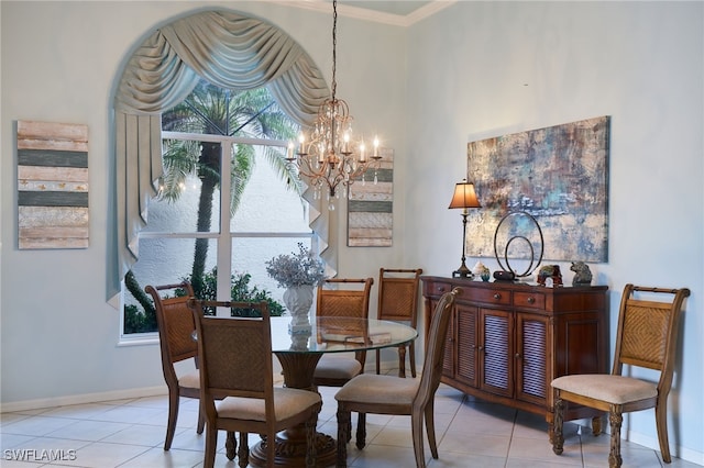 tiled dining room featuring a notable chandelier and crown molding