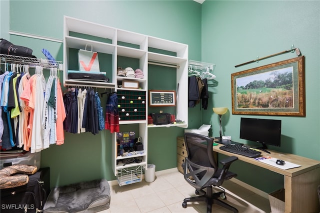 home office with light tile patterned flooring