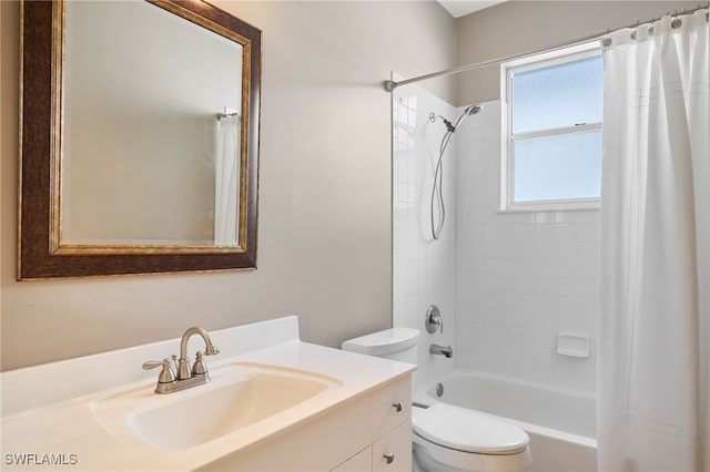 full bathroom featuring toilet, vanity, and shower / bath combo with shower curtain