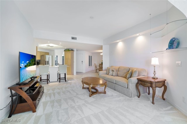 2233 Anchorage Ln Unit B, Naples, FL 34104 - living room featuring light colored carpet, baseboards, and recessed lighting