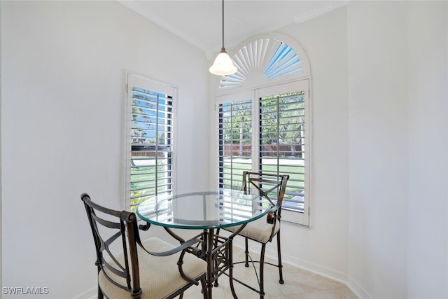 2233 Anchorage Ln Unit B, Naples, FL 34104 - dining area with baseboards and light tile patterned flooring