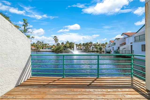 view of pool featuring a water view