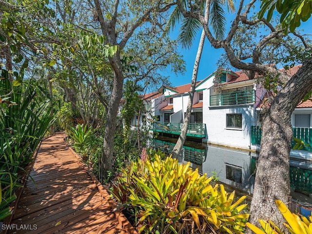 2233 Anchorage Ln Unit B, Naples, FL 34104 - view of property exterior with stucco siding