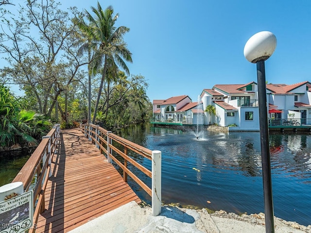 view of dock with a water view