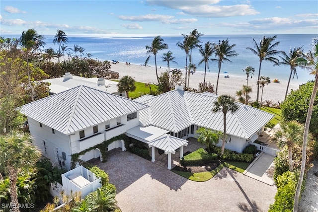 bird's eye view featuring a beach view and a water view