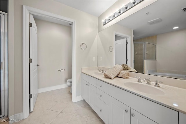 full bathroom with tile patterned floors, vanity, toilet, and separate shower and tub