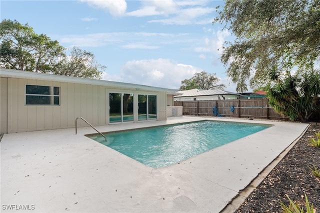 view of pool featuring a patio area