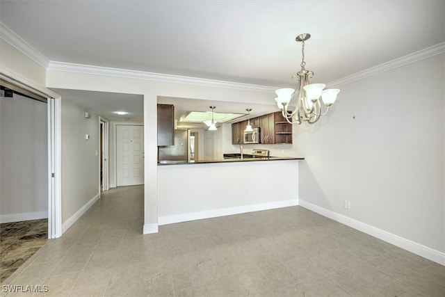 kitchen with kitchen peninsula, pendant lighting, a notable chandelier, appliances with stainless steel finishes, and ornamental molding